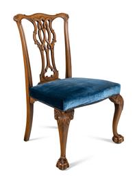 A Set of Ten George III Style Carved Mahogany Dining Chairs
