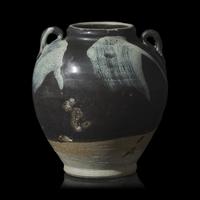 A Chinese Stoneware Phosphatic-Splashed Jar, Possibly Tang Dynasty 或爲唐 魯山窯黑釉撒白斑雙繫罐