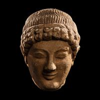 A Cypriot Limestone Head of a Youth