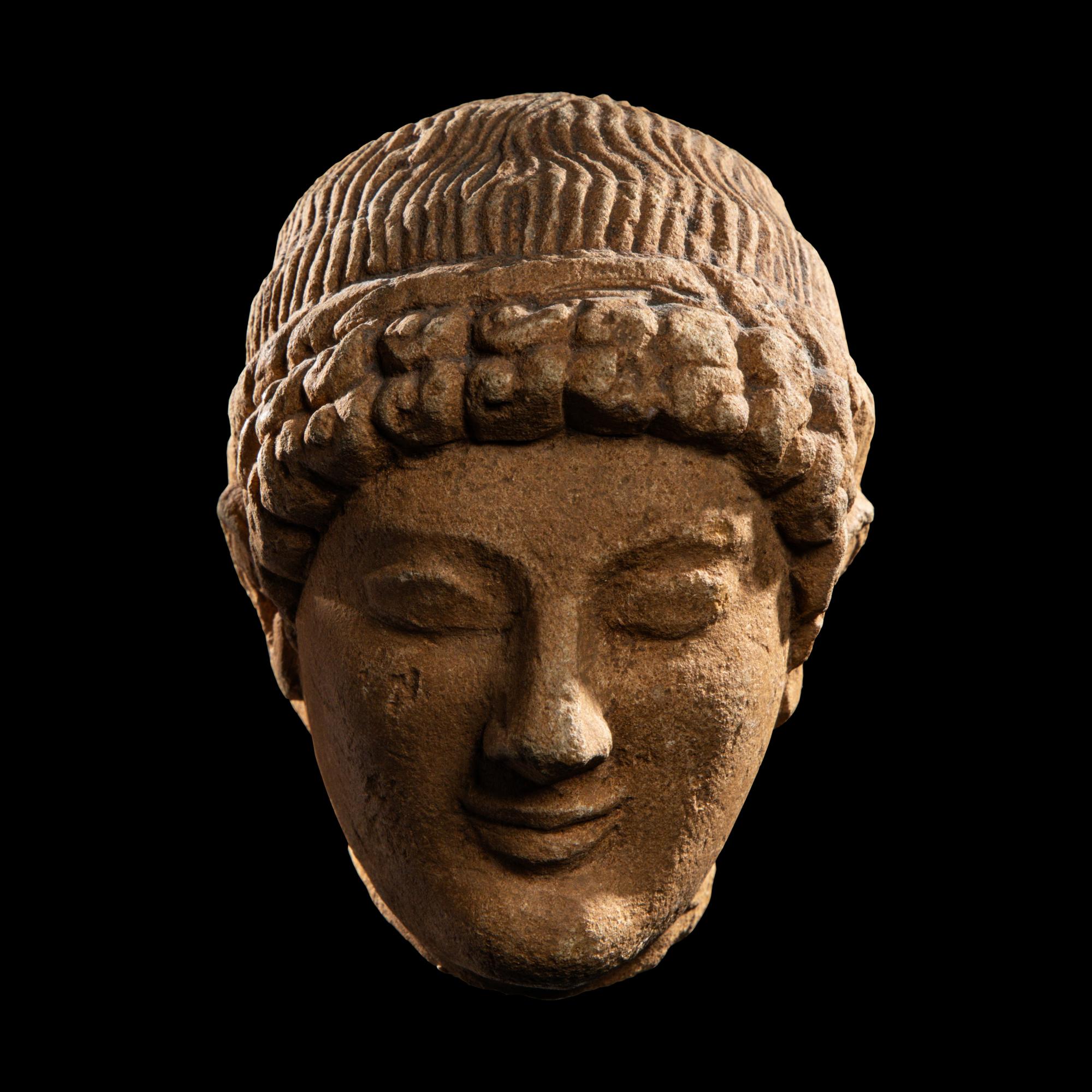 A Cypriot Limestone Head of a Youth