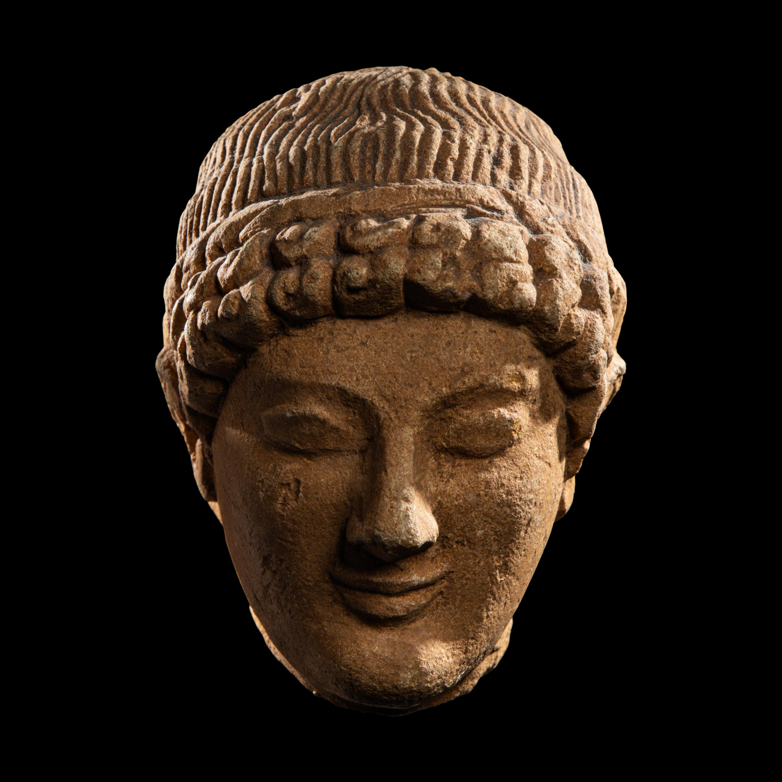 A Cypriot Limestone Head of a Youth