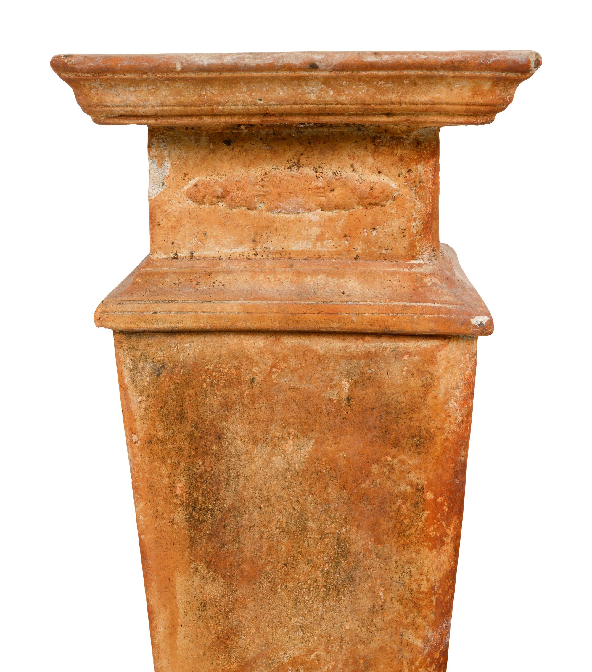 A Group of Six Cast Stone Pedestals