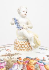 A Continental Gilt Metal Mounted Porcelain Covered Urn