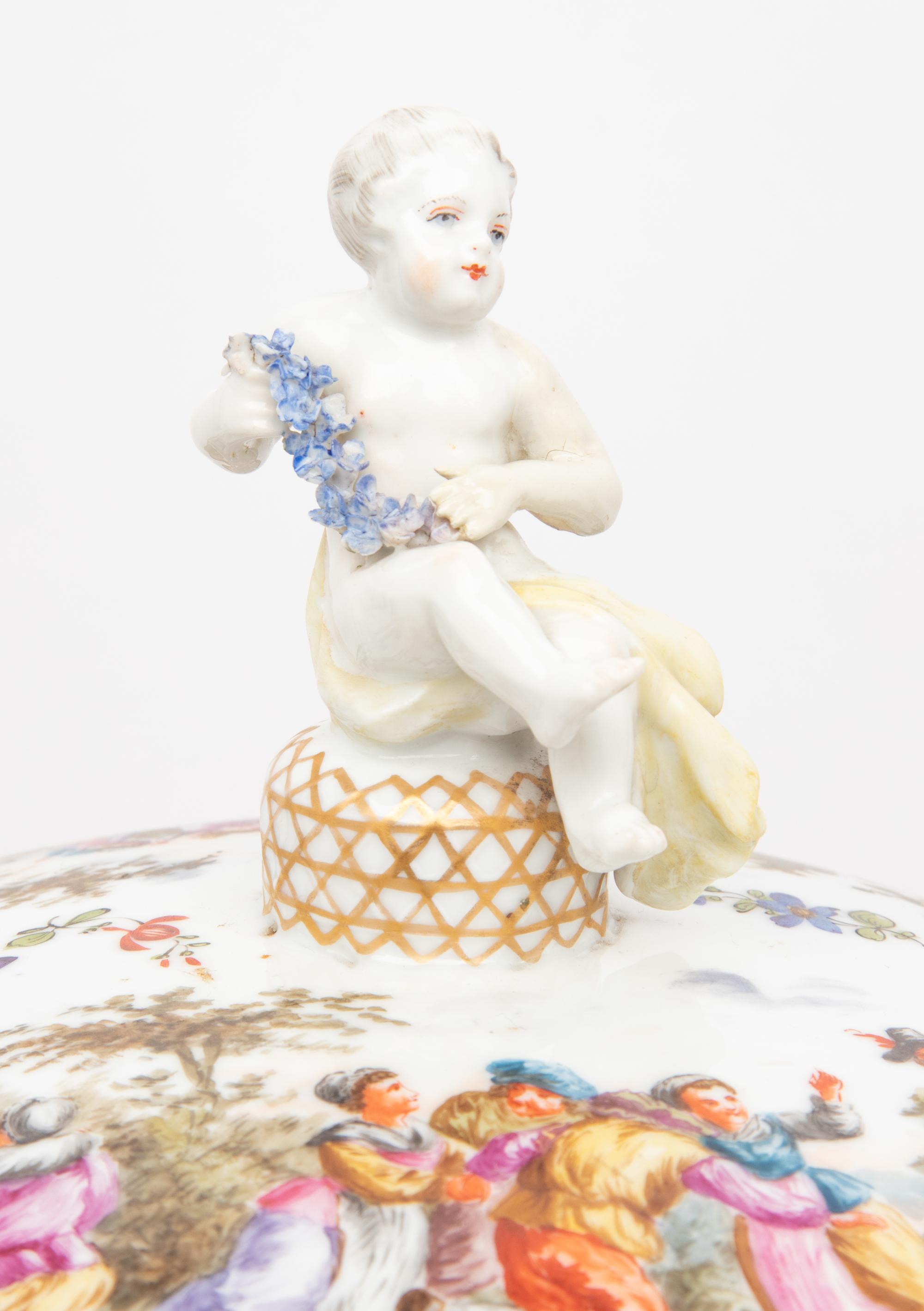A Continental Gilt Metal Mounted Porcelain Covered Urn