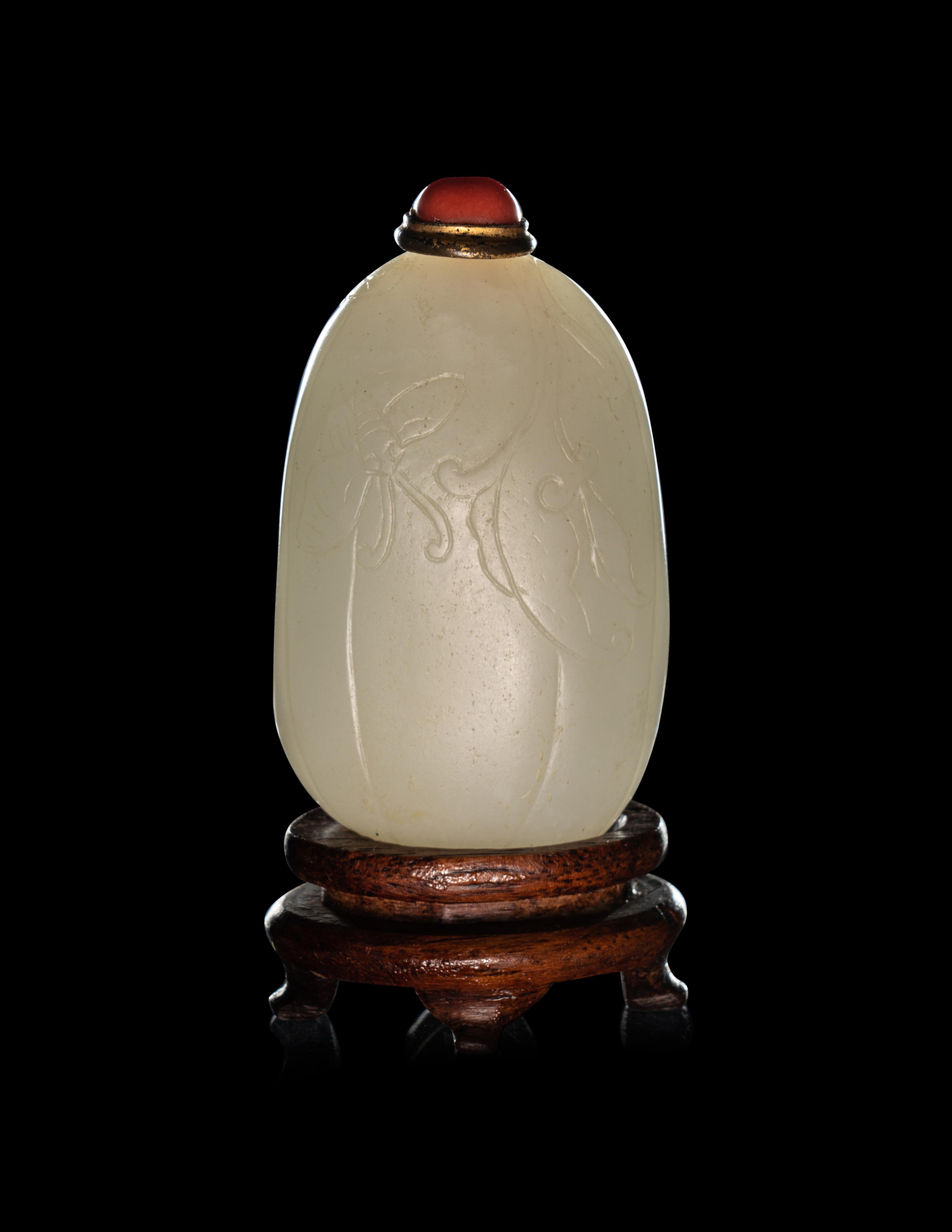A White Jade Pebble-Form 'Melon' Snuff Bottle