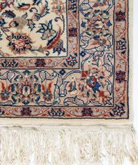 A Kashan Wool Rug