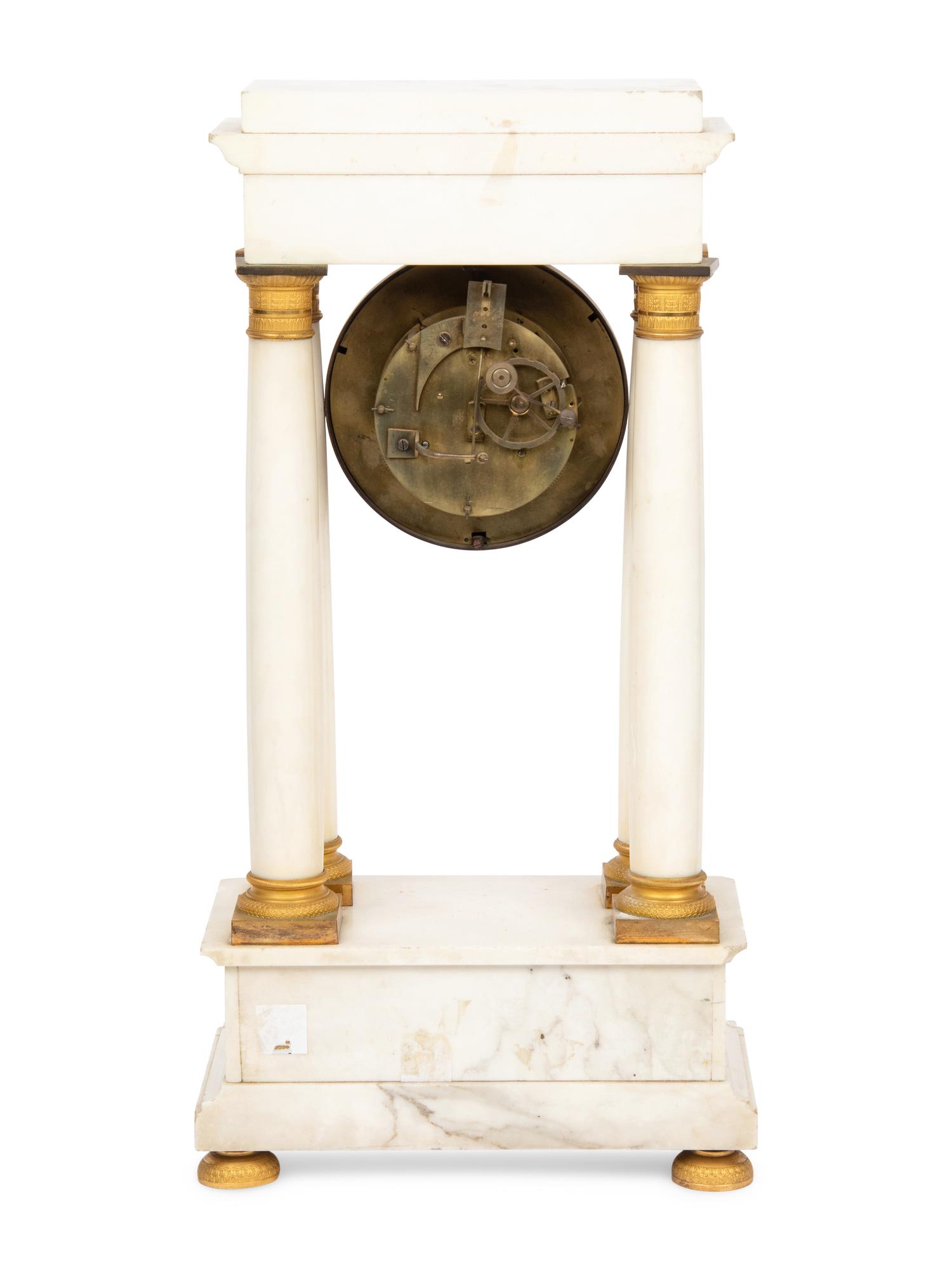 A Napoleon III Marble and Gilt Bronze Mounted Portico Clock