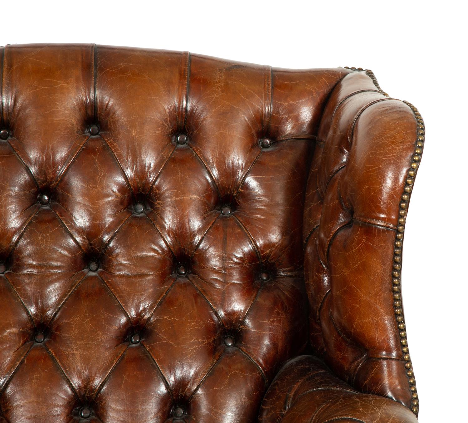 A George III Style Leather Wingback Armchair