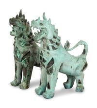 A Pair of Large Patinated Bronze Temple Lions