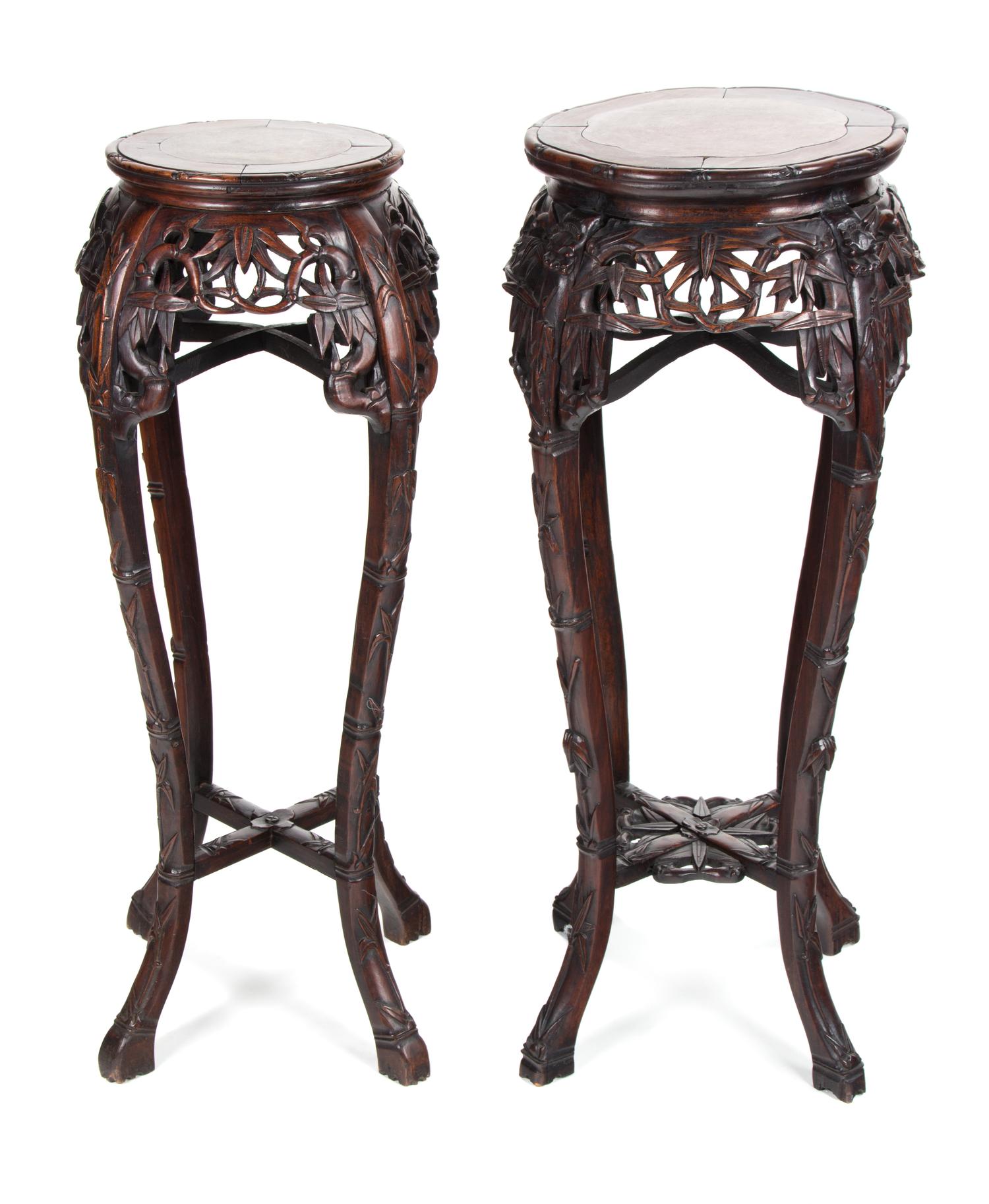 Two Chinese Export Carved Rosewood Pedestals Height of taller 37 inches. — 19TH/20TH CENTURY