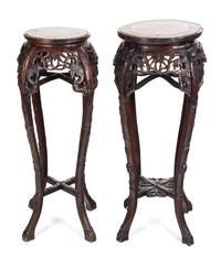 Two Chinese Export Carved Rosewood Pedestals Height of taller 37 inches. — 19TH/20TH CENTURY