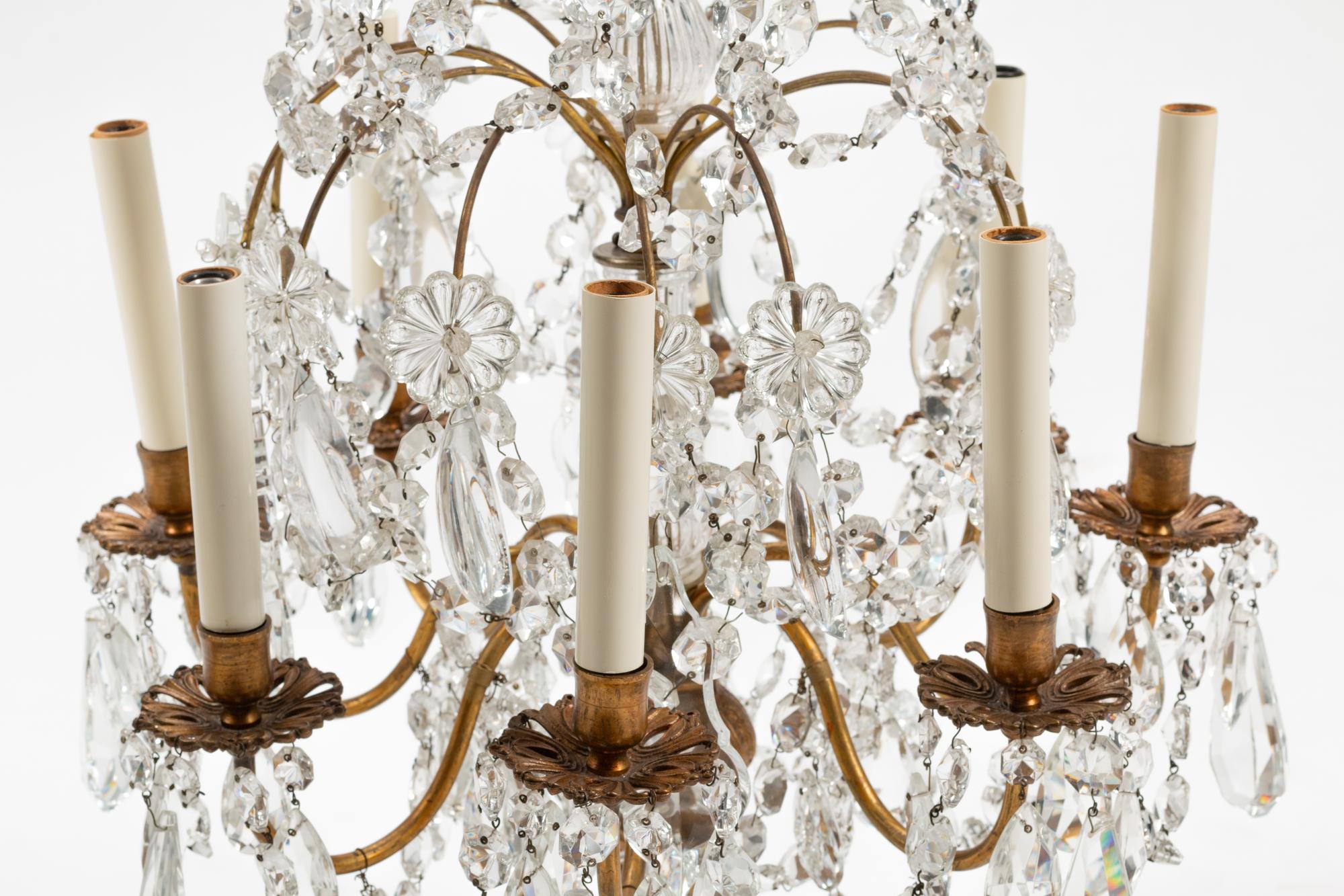 A Pair of French Gilt Bronze and Cut Glass Eight-Light Candelabra