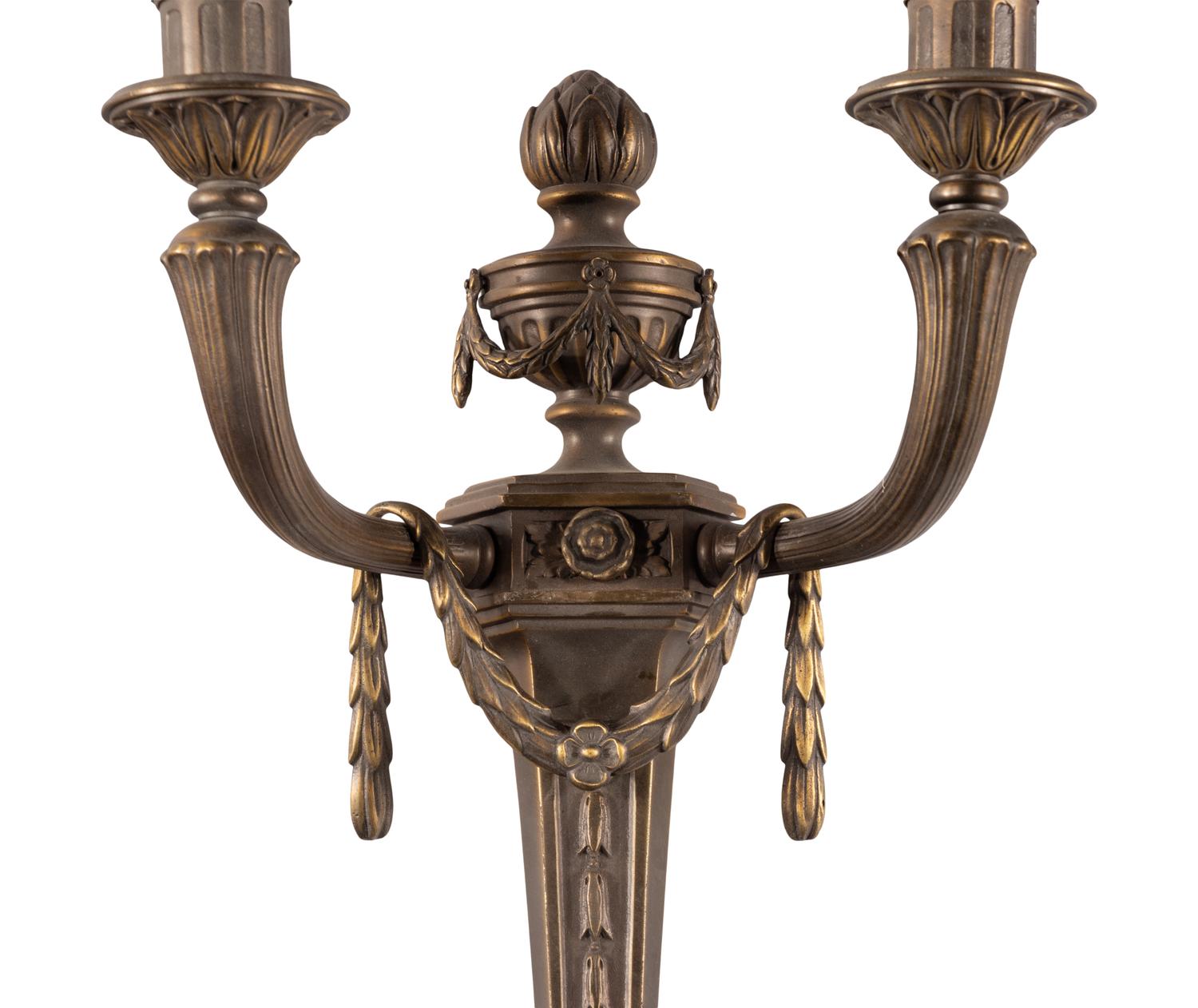 A Set of Four Louis XVI Style Gilt Metal Two-Light Sconces