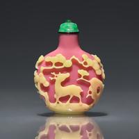 A Chinese Yellow-Overlaid Pink Glass Snuff Bottle, Qing Dynasty, Circa 1780-1860 — 1780-1860年 粉紅地套黃料鹿鶴同春圖鼻煙壺