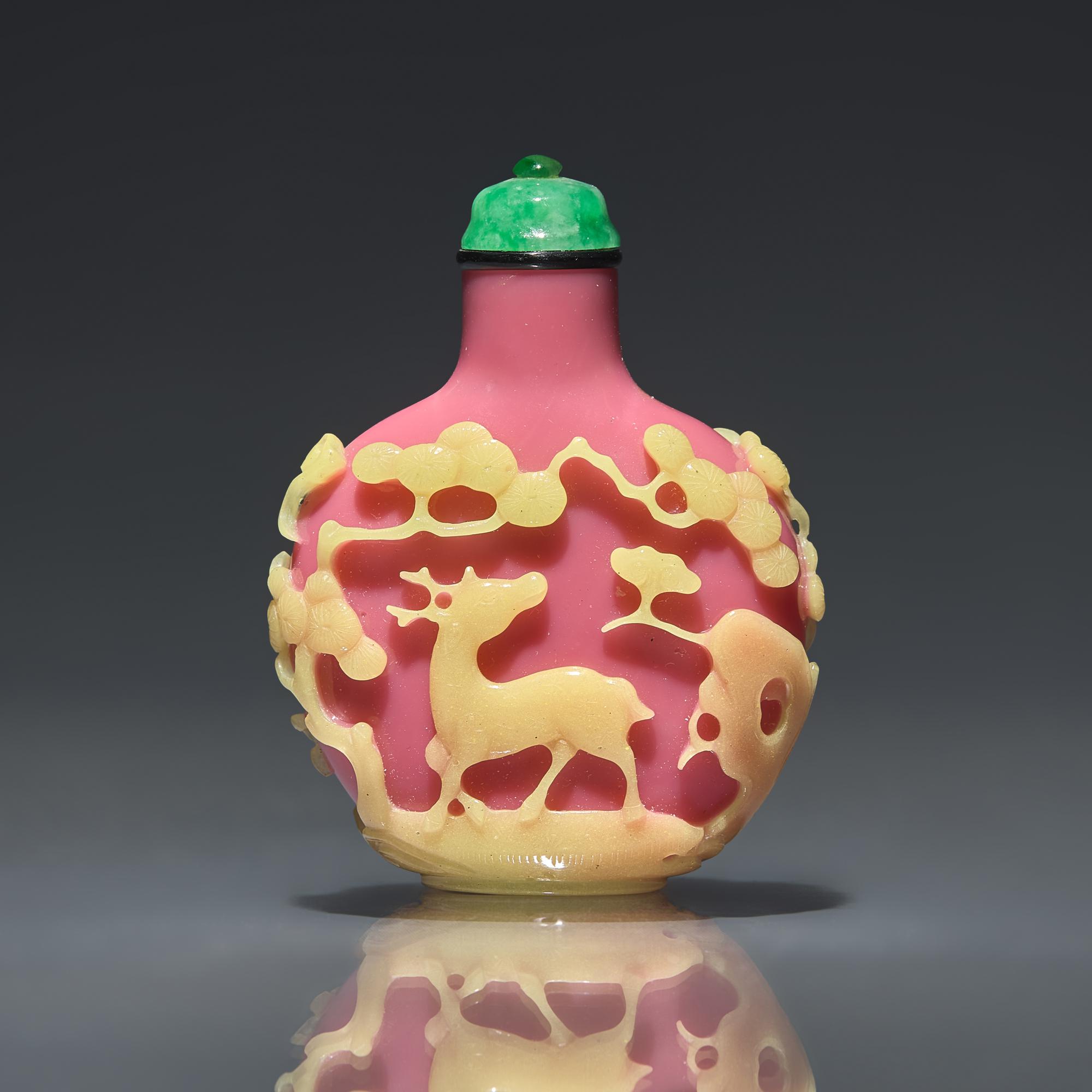 A Chinese Yellow-Overlaid Pink Glass Snuff Bottle, Qing Dynasty, Circa 1780-1860 — 1780-1860年 粉紅地套黃料鹿鶴同春圖鼻煙壺