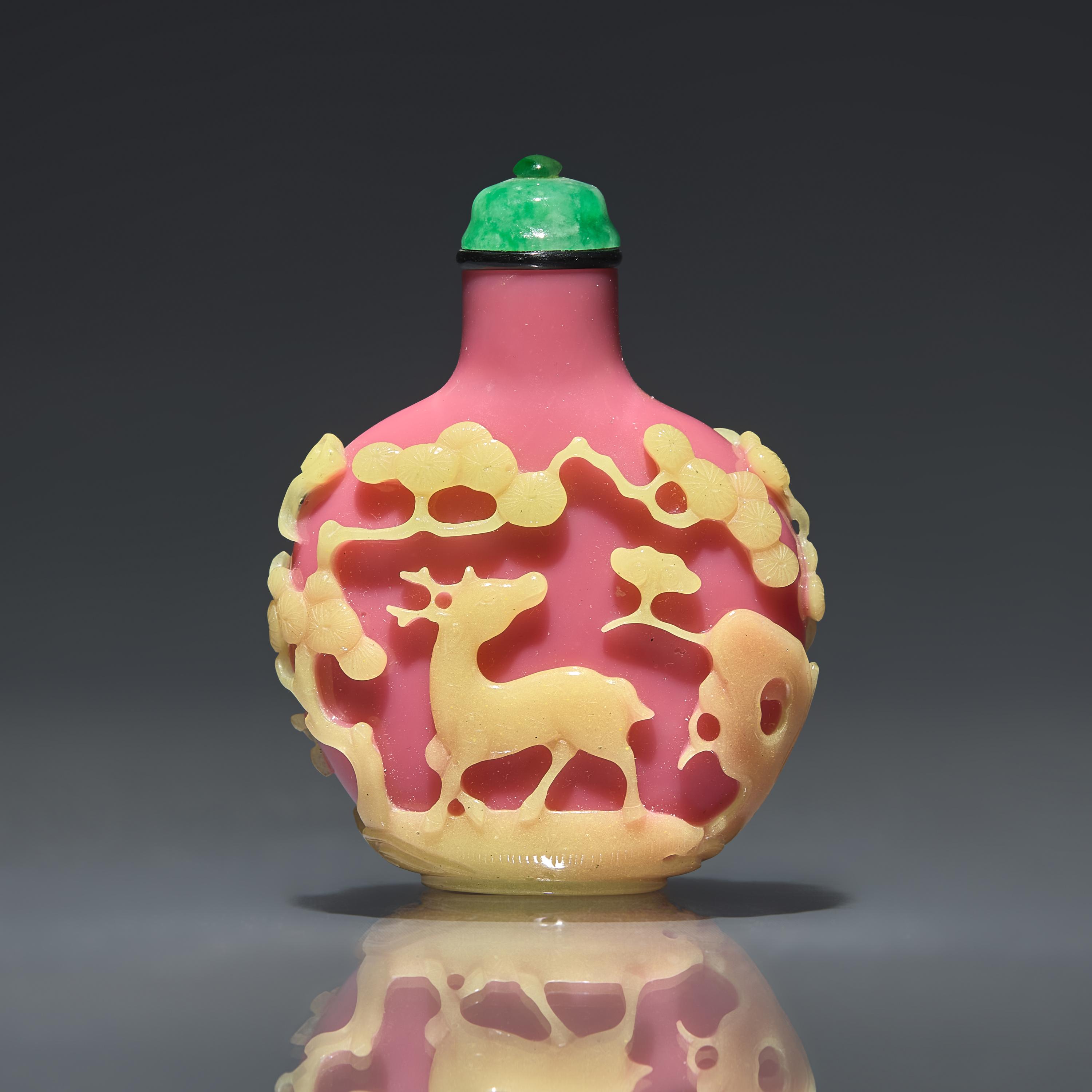A Chinese Yellow-Overlaid Pink Glass Snuff Bottle, Qing Dynasty, Circa 1780-1860 — 1780-1860年 粉紅地套黃料鹿鶴同春圖鼻煙壺