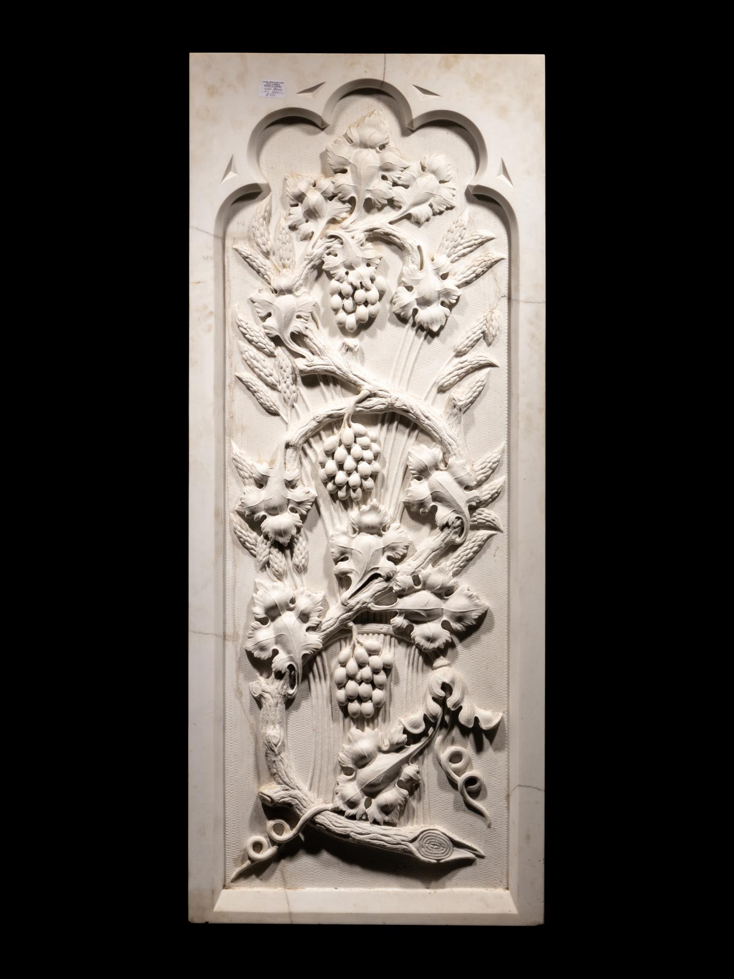A Carved Marble Wall Relief Plaque
