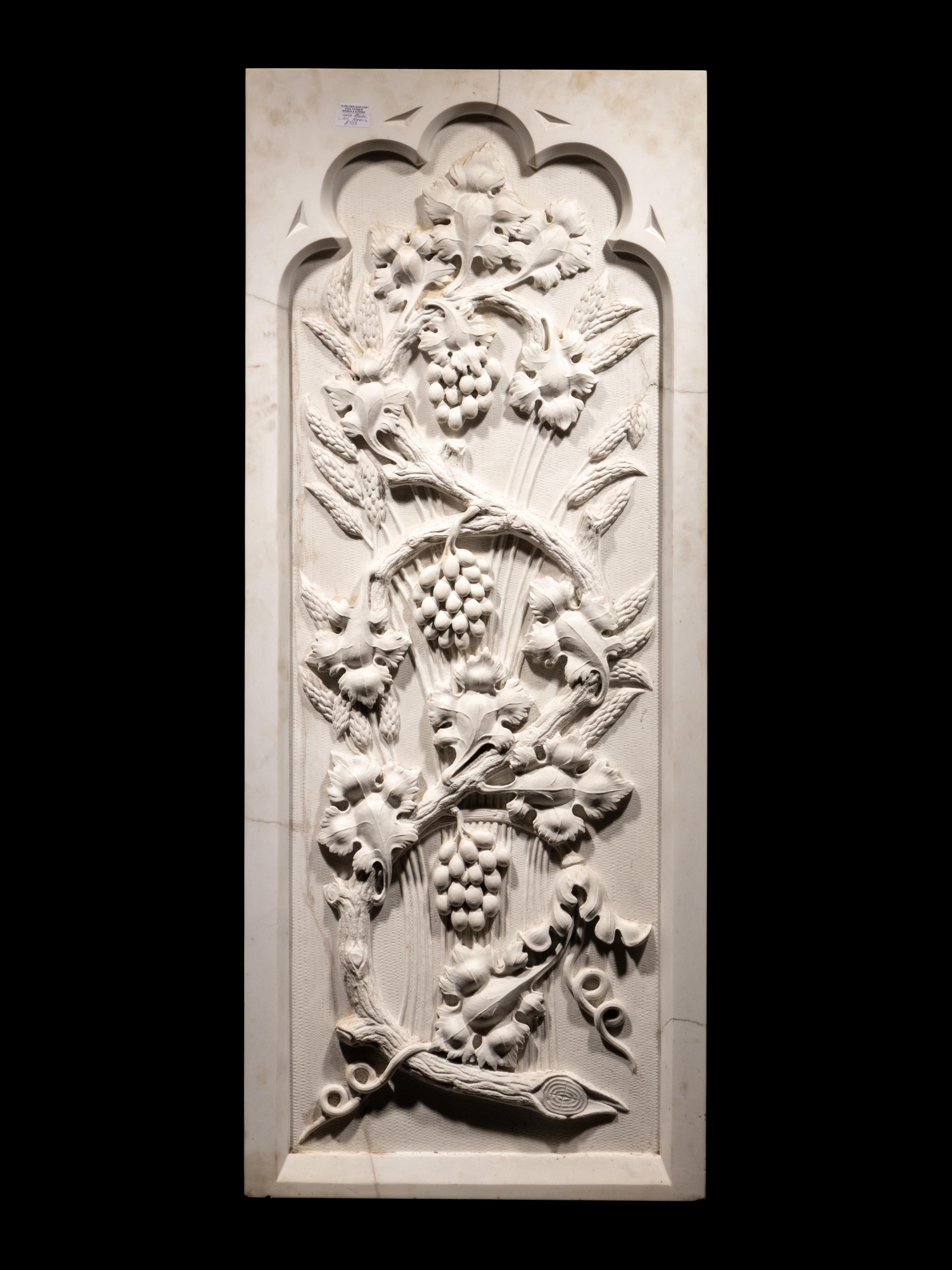 A Carved Marble Wall Relief Plaque