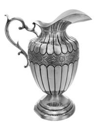 A Mexican Silver Water Pitcher, Tobias, 20th Century, of baluster form, worked to show floral blossoms.