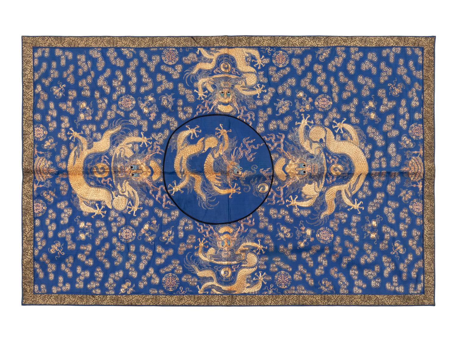 A Chinese Blue Ground Embroidered Silk 'Dragon' Panel