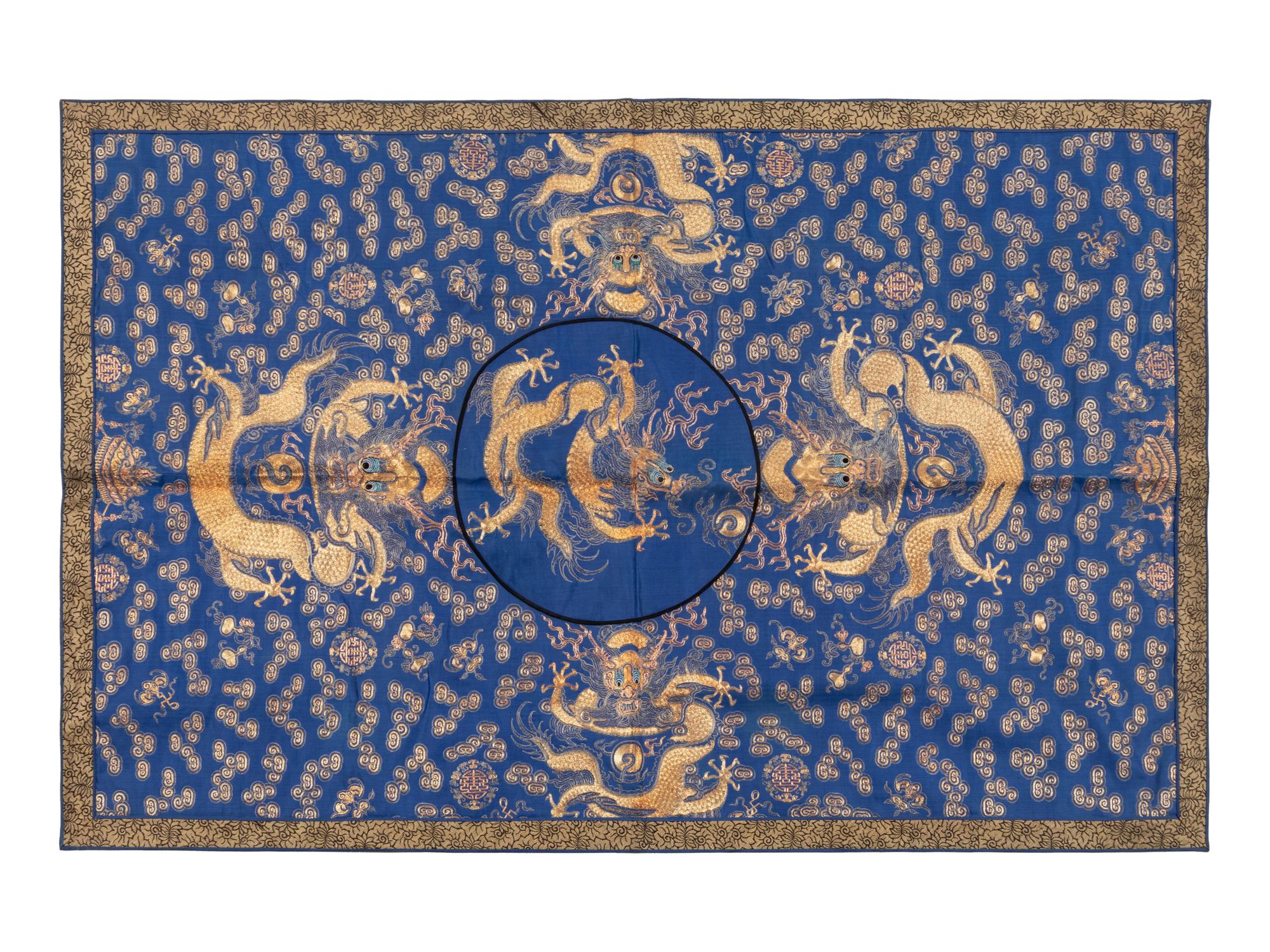 A Chinese Blue Ground Embroidered Silk 'Dragon' Panel