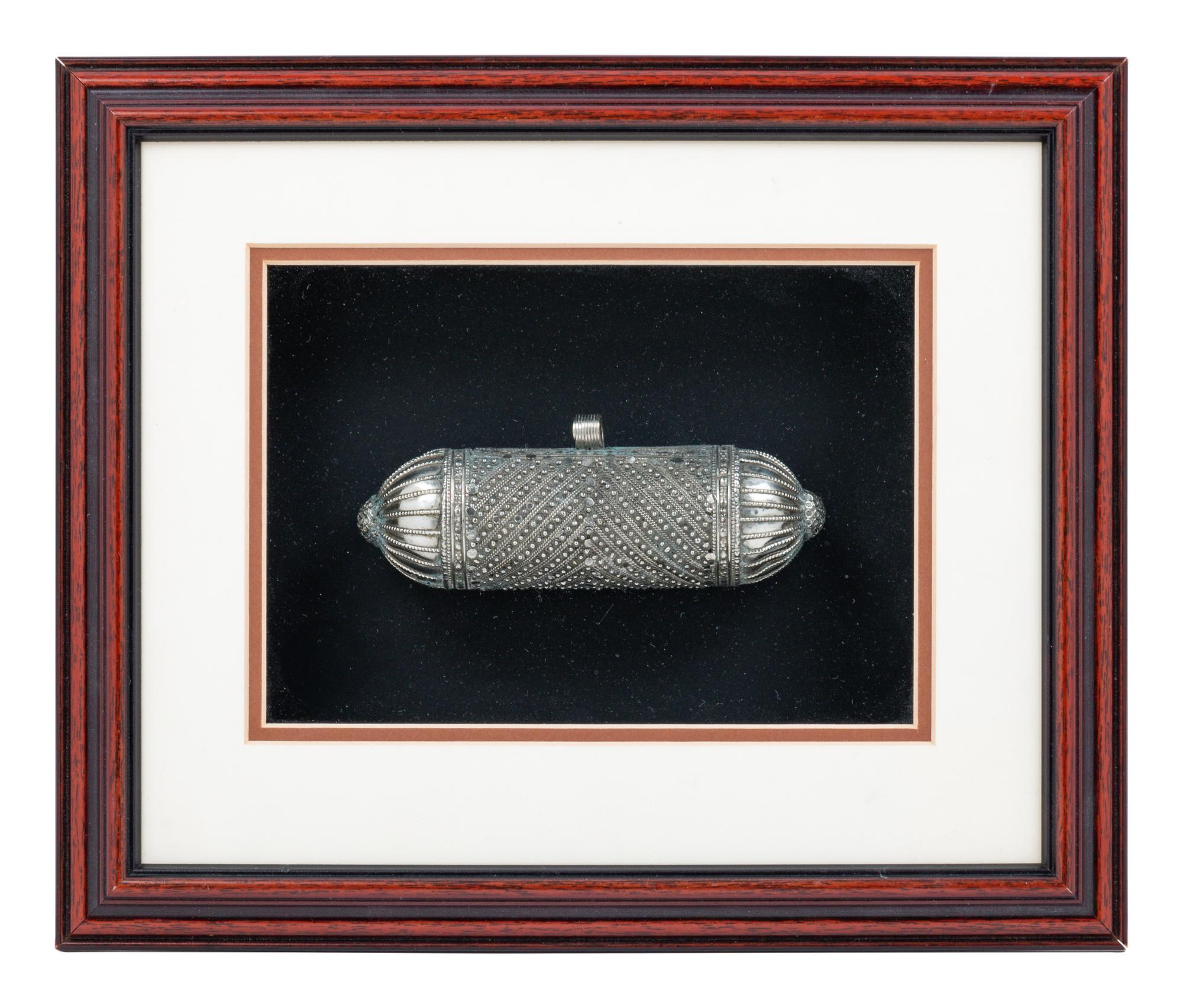 A Silver Mezuzah Pendant
