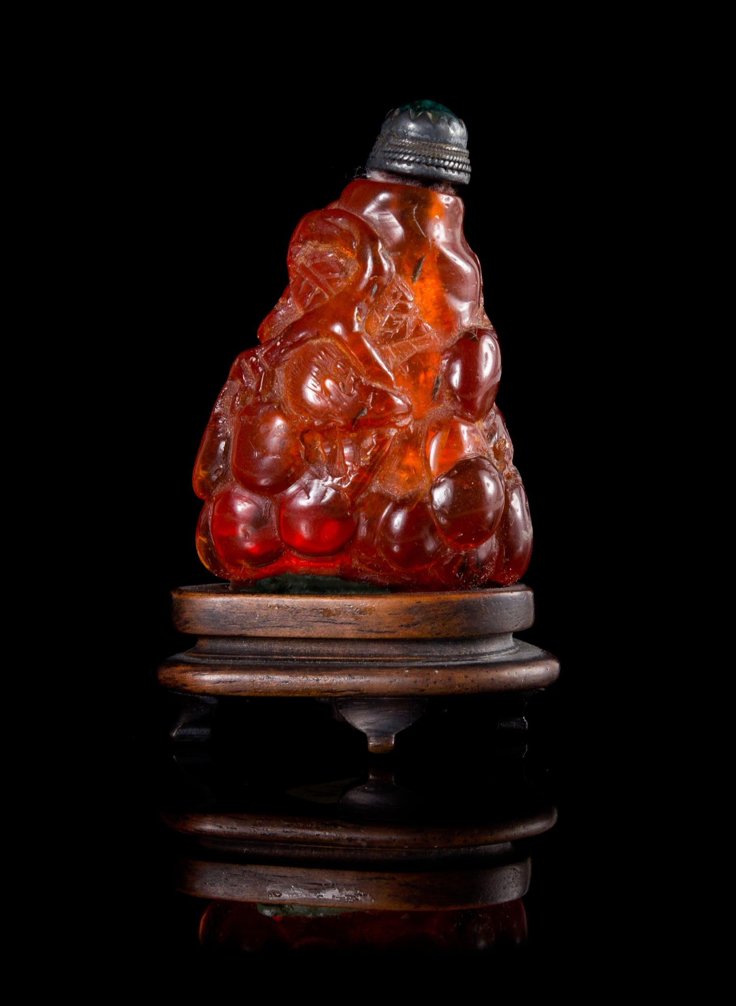 An Amber Snuff Bottle Height 2 inches.