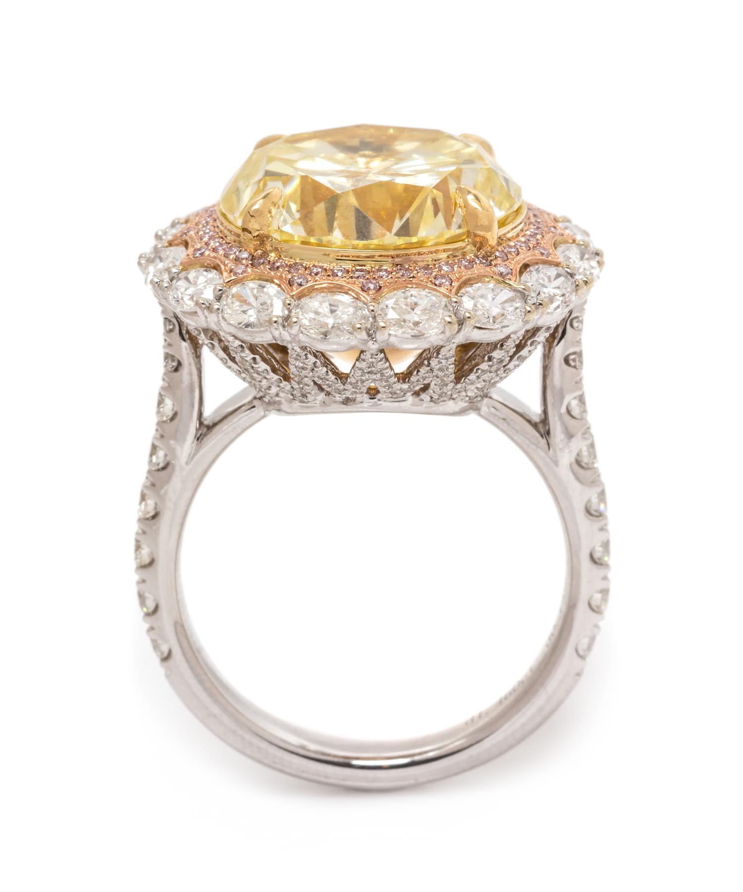 An 18 Karat Tricolor Gold, Fancy Yellow Diamond, Diamond and Colored Diamond Ring, 10.10 dwts.