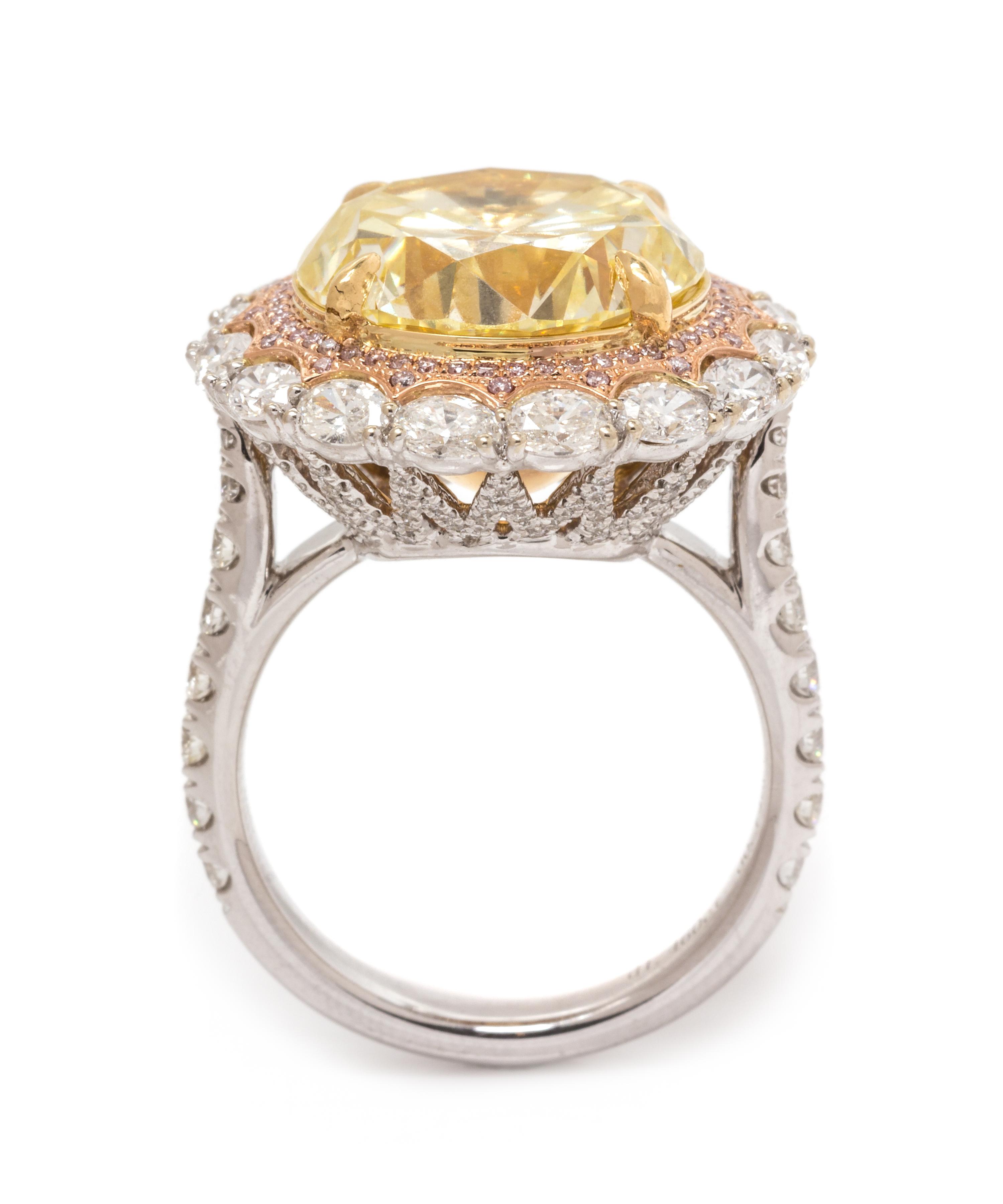 An 18 Karat Tricolor Gold, Fancy Yellow Diamond, Diamond and Colored Diamond Ring, 10.10 dwts.