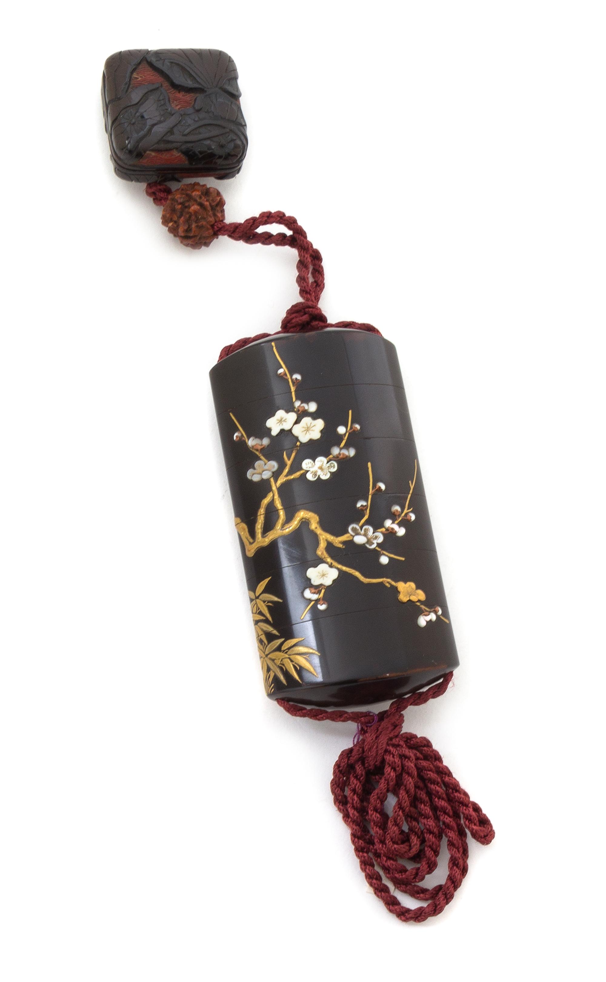 A Gilt Lacquered Mother-of-Pearl Inlaid Five-Case Inro Height 3 3/4 inches.