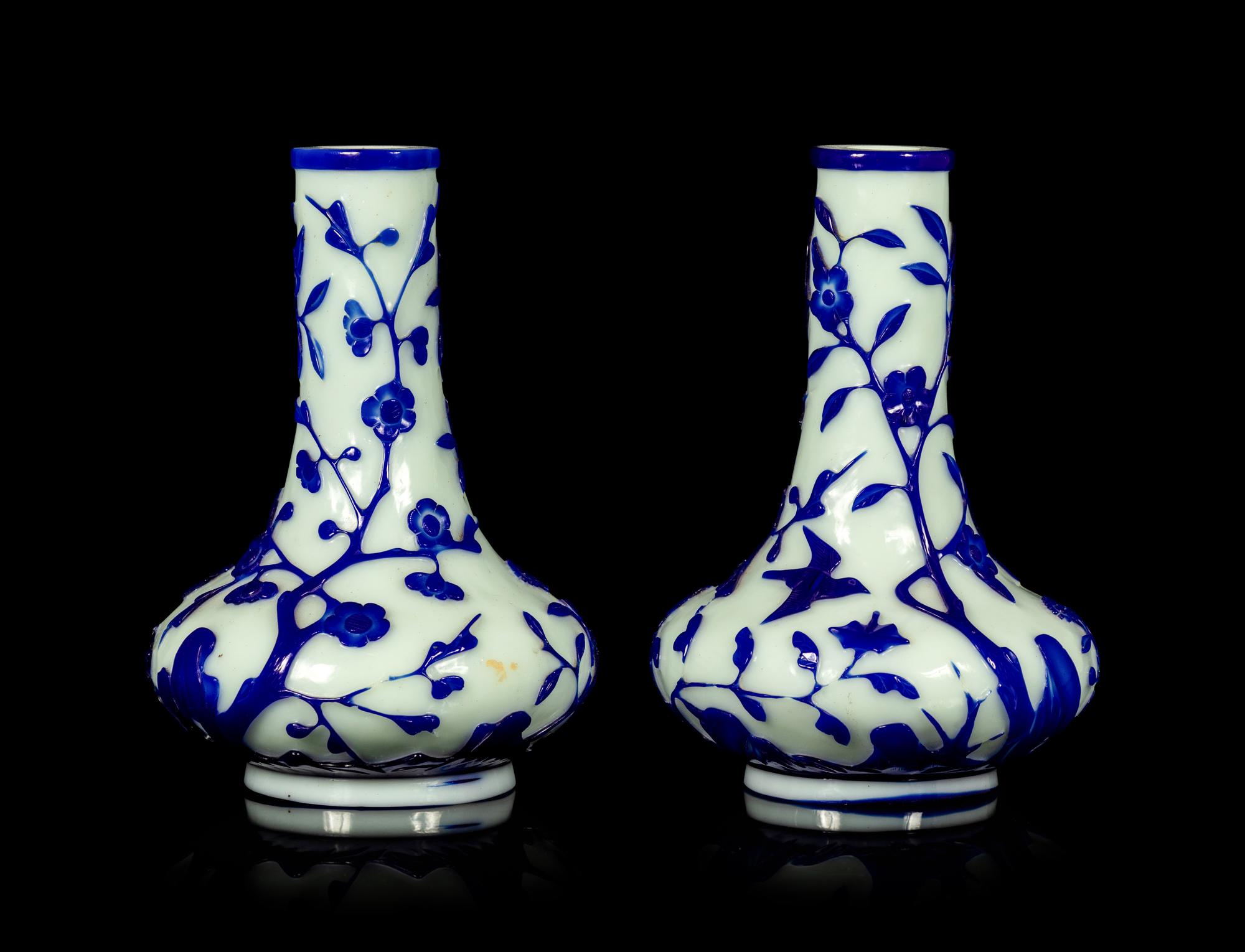 A Pair of Chinese Blue Overlay Opaque White Glass Bottle Vases