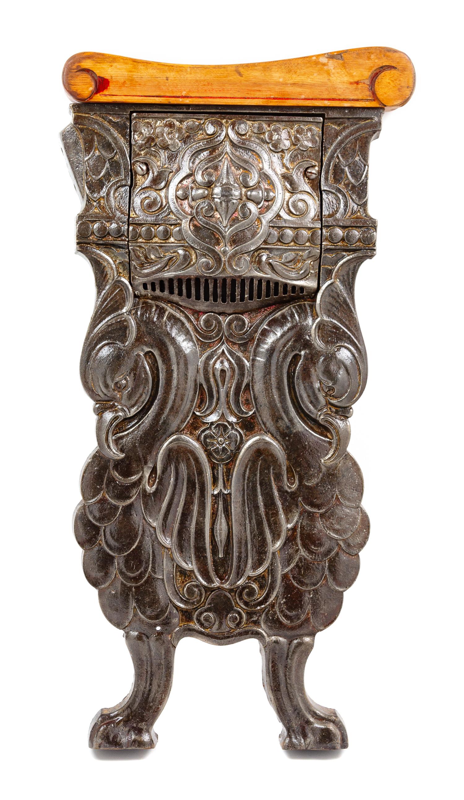 An Oriental Theater Auditorium Figural Seat End Height 25 1/2 inches. — CIRCA 1920'S