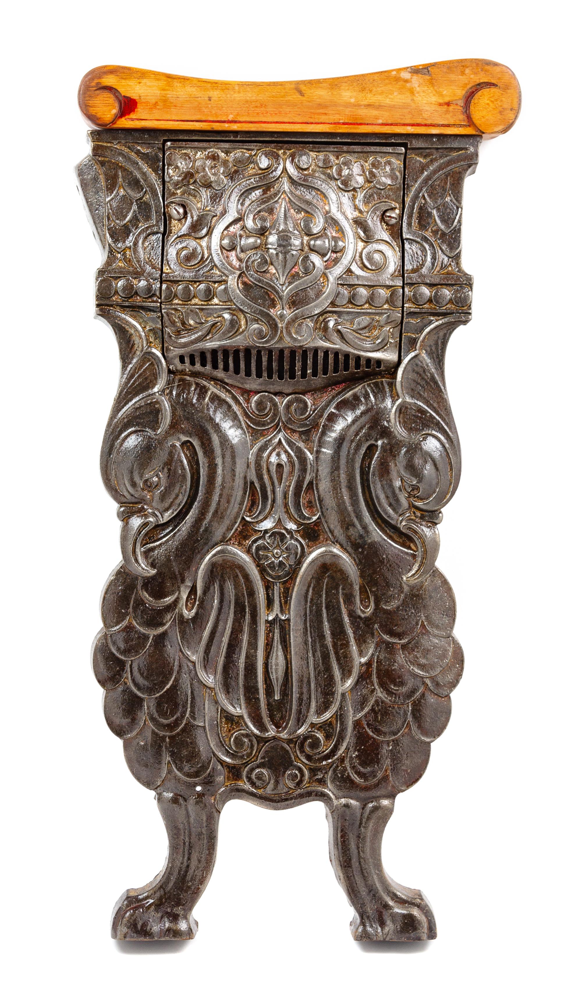 An Oriental Theater Auditorium Figural Seat End Height 25 1/2 inches. — CIRCA 1920'S