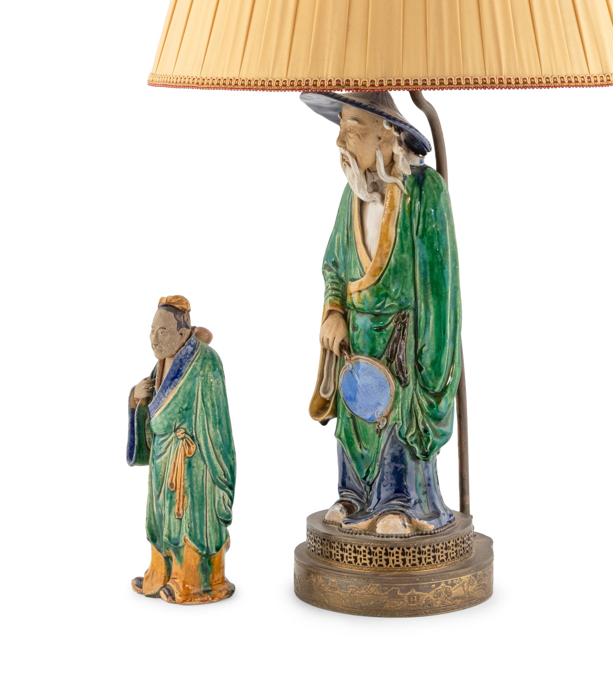 A Chinese Glazed Earthenware Figure Mounted as a Lamp