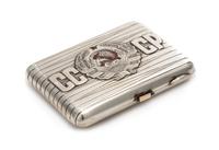 A Soviet-Era Latvian Silver Cigarette Case, Maker's Mark Cyrillic MYu4, Riga, Mid-20th Century, the banded case with applied letters an