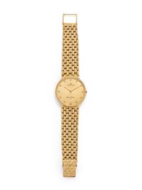UNIVERSAL GENEVE, 18K YELLOW GOLD AND DIAMOND WRISTWATCH