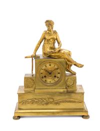 An Empire Gilt Bronze Mantel Clock Height 15 1/2 inches. — FIRST HALF 19TH CENTURY