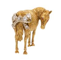 An 18 Karat Yellow Gold, Diamond and Ruby Articulated Horse Brooch, 9.50 dwts.
