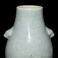 Two Chinese Monochrome Glazed Porcelain Vases, 19th/20th Century — 晚清/民國 銅紅釉賞瓶及仿官窯雙耳壺