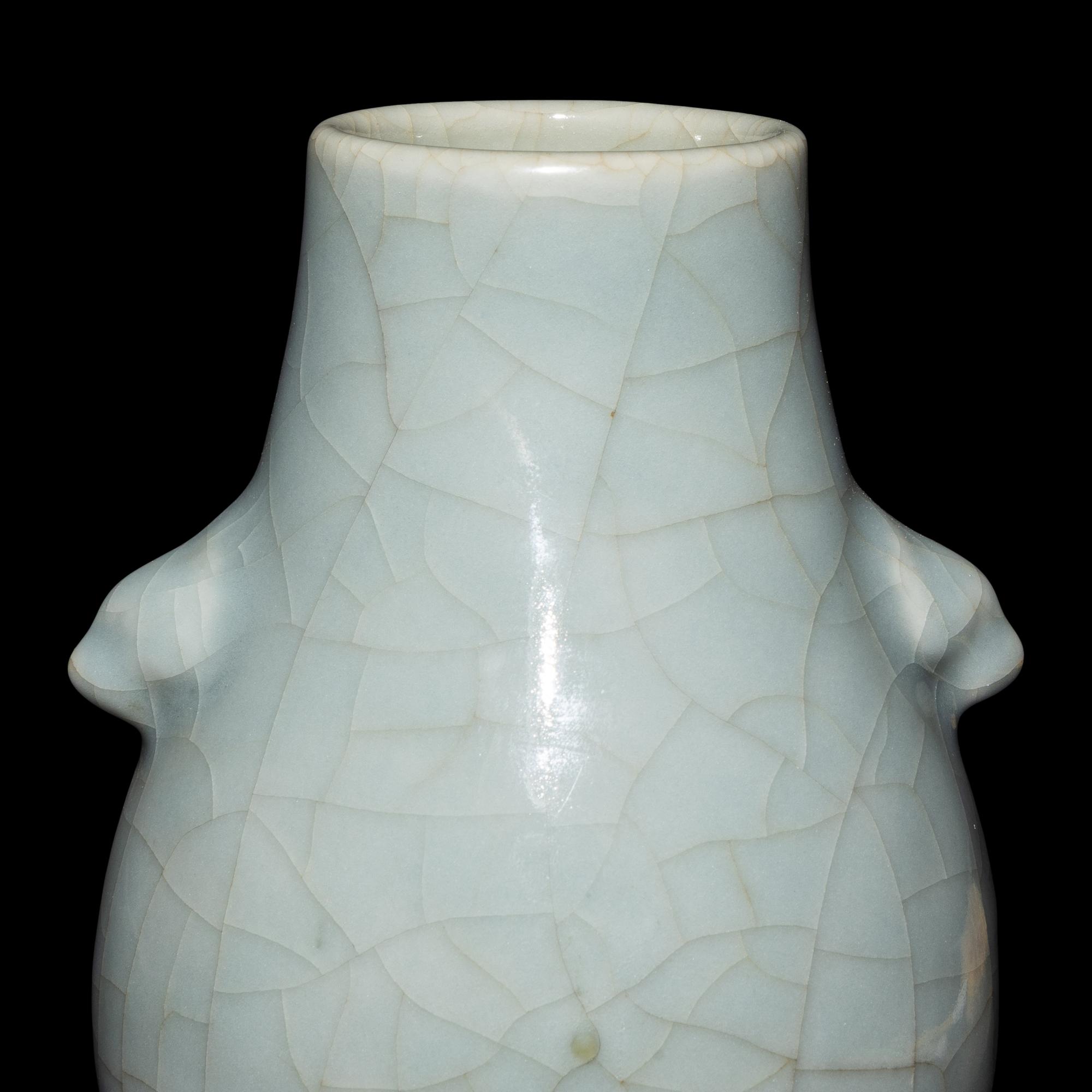 Two Chinese Monochrome Glazed Porcelain Vases, 19th/20th Century — 晚清/民國 銅紅釉賞瓶及仿官窯雙耳壺