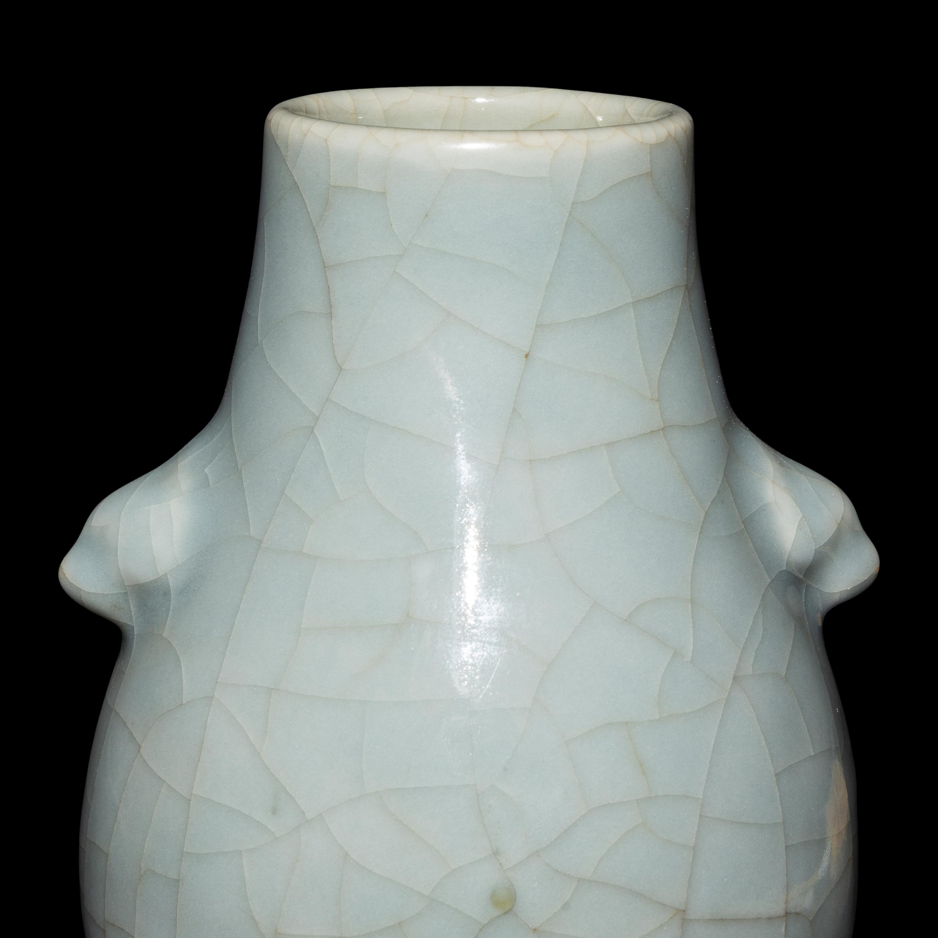 Two Chinese Monochrome Glazed Porcelain Vases, 19th/20th Century — 晚清/民國 銅紅釉賞瓶及仿官窯雙耳壺