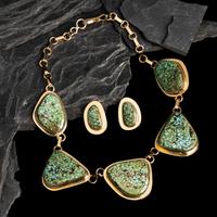 Tommy Jackson (Diné, b. 1958) — 14K Gold and Gem Grade Turquoise Necklace and Matching Clip Earrings