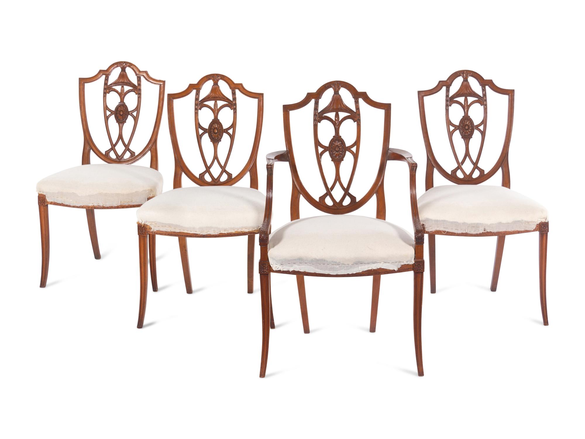 A Set of Four Federal Carved Cherrywood Shield-Back Dining Chairs