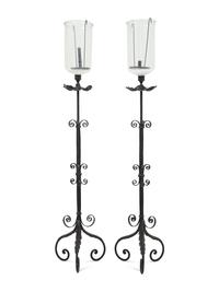 A Pair of Spanish Colonial Style Wrought Iron Floor Lanterns