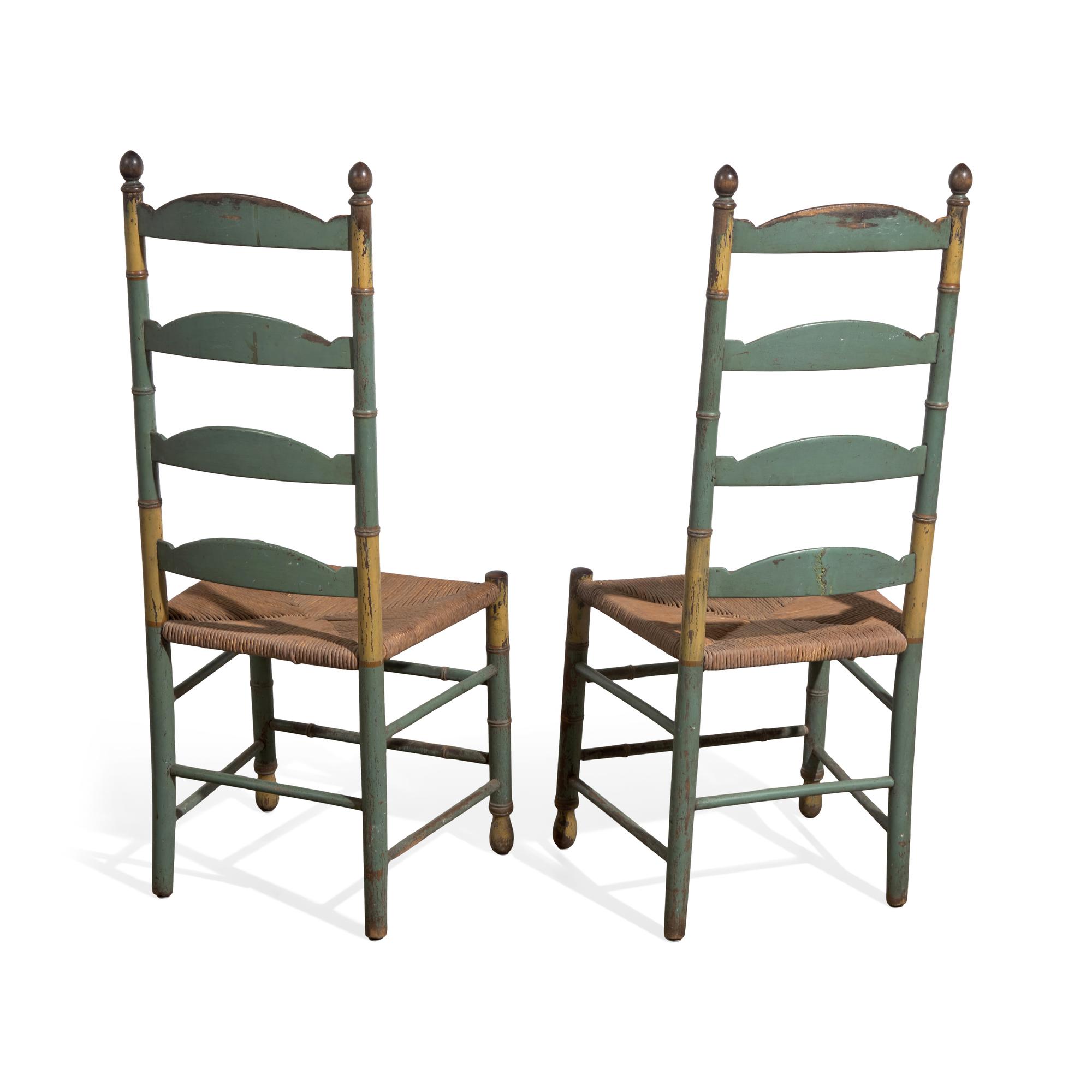 A Pair of Green-Painted and Decorated Ladder-Back Rush-Seat Side Chairs