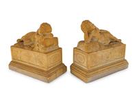 A Pair of Marble Models of Sleeping Cherubs on Plinths