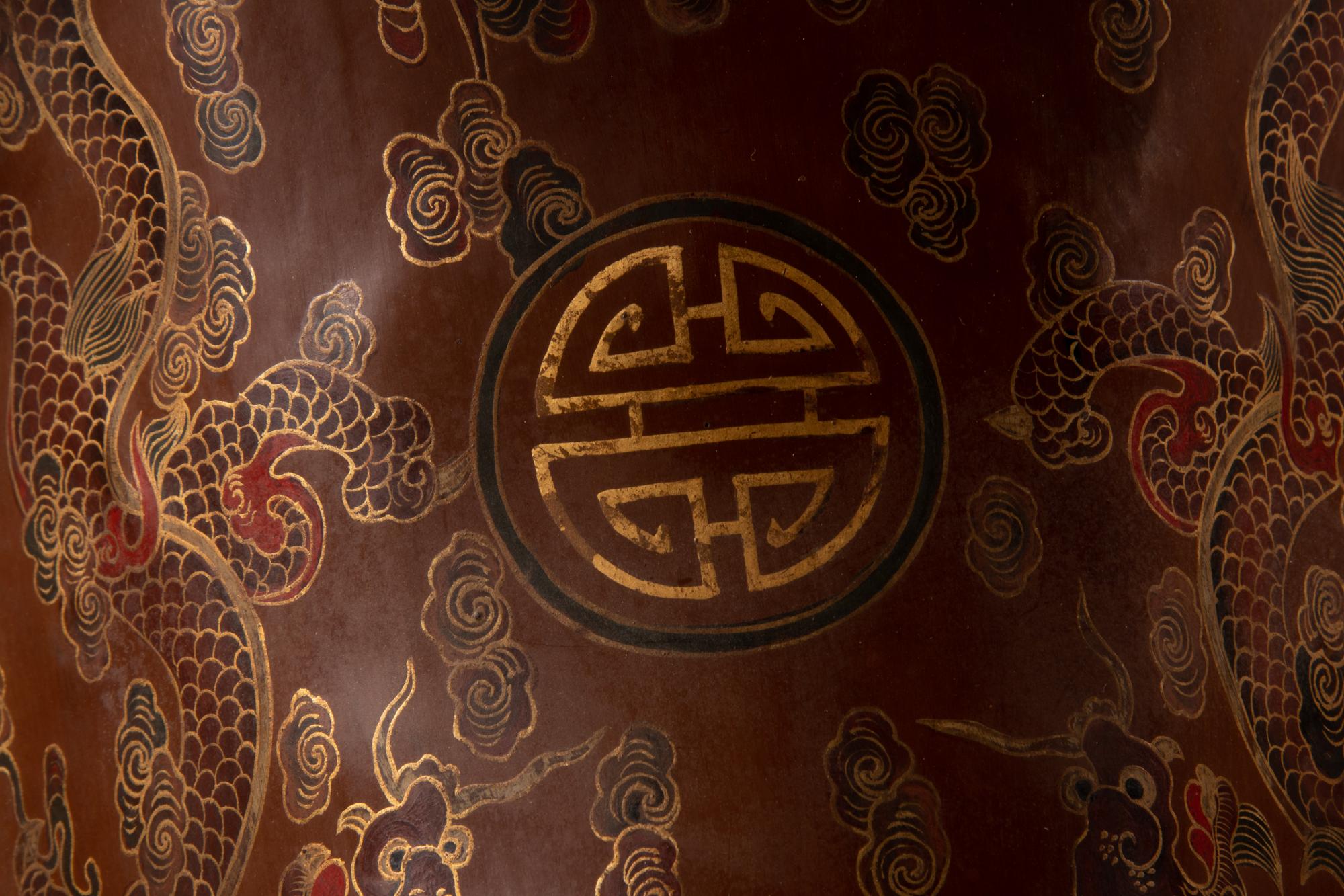 A Gilt and Polychrome Painted Red Lacquer Saddle and Two Pads