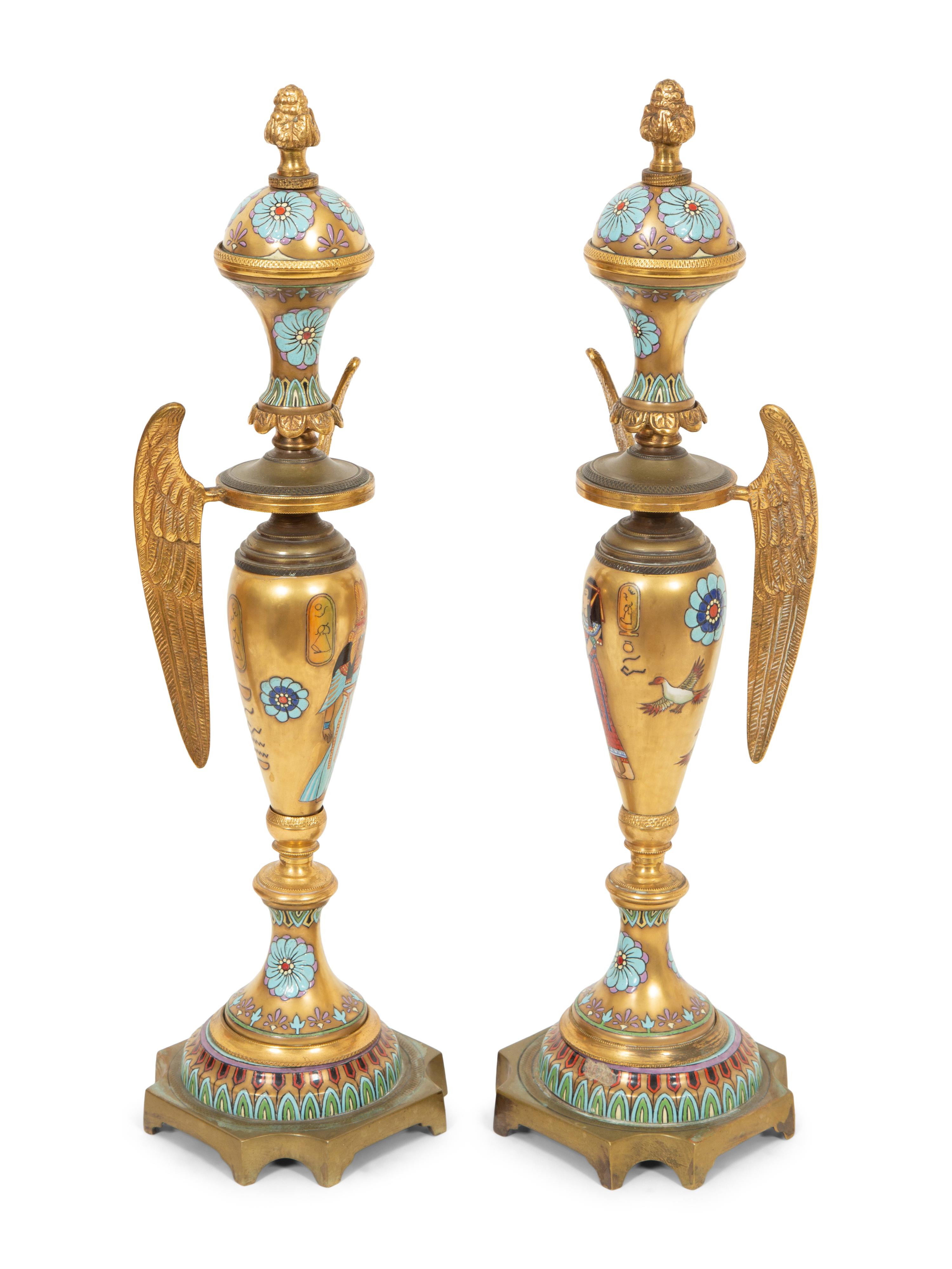 A Pair of Continental Egyptian Revival Porcelain and Gilt Bronze Urn Ornaments