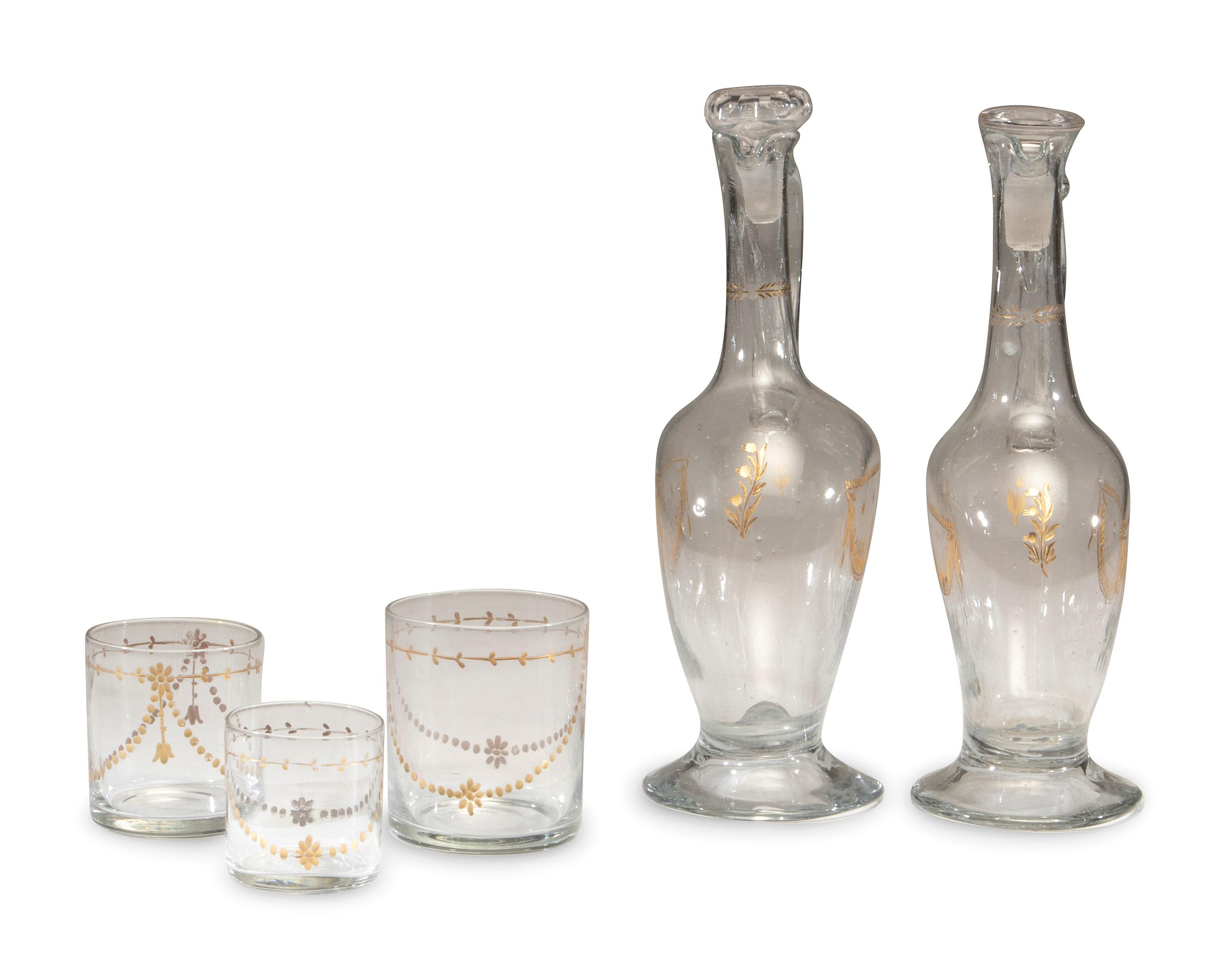 A Continental Gilt-Decorated Blown Glass Beverage Set