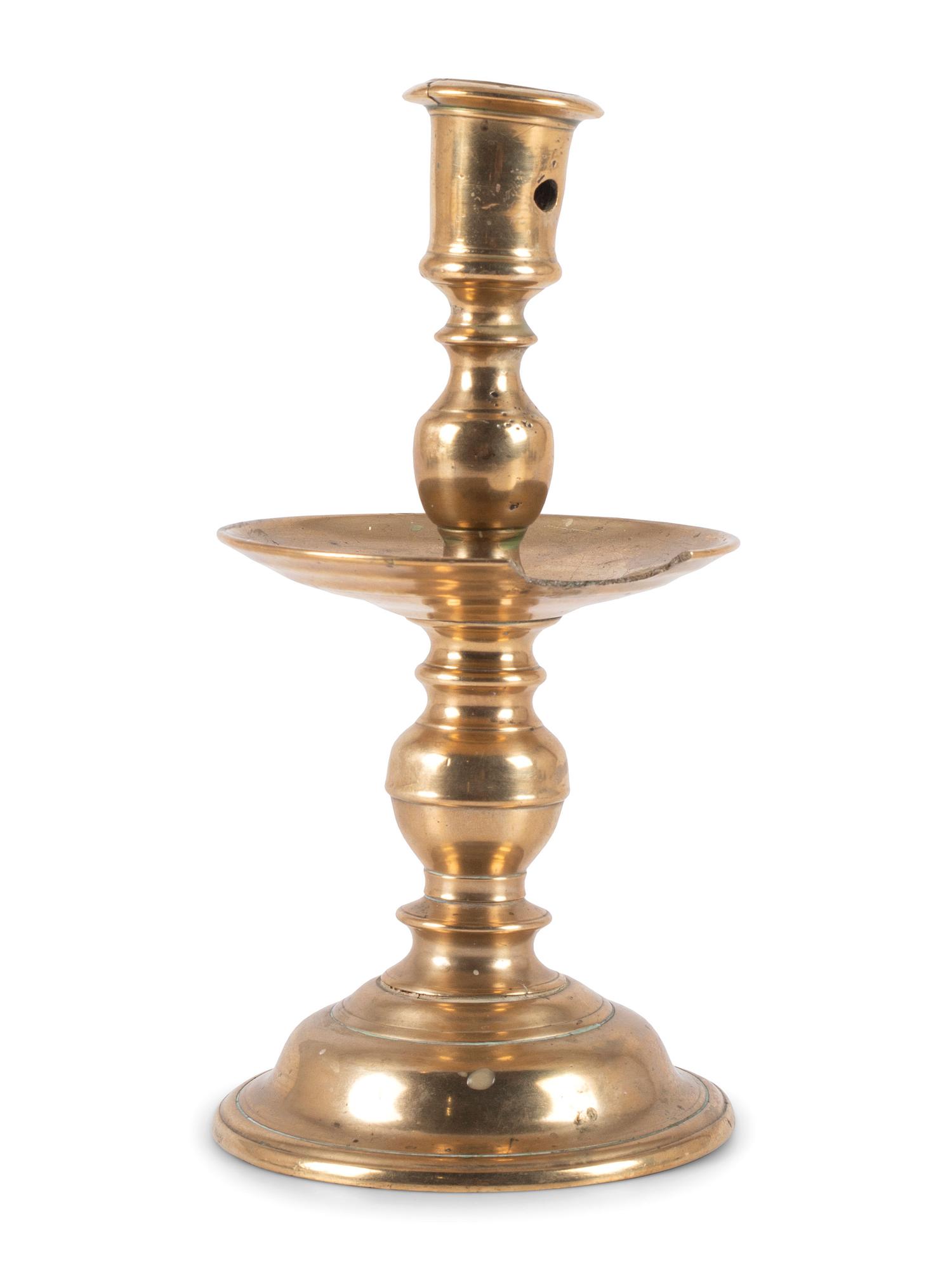 A Dutch Brass Heemskerk Candlestick